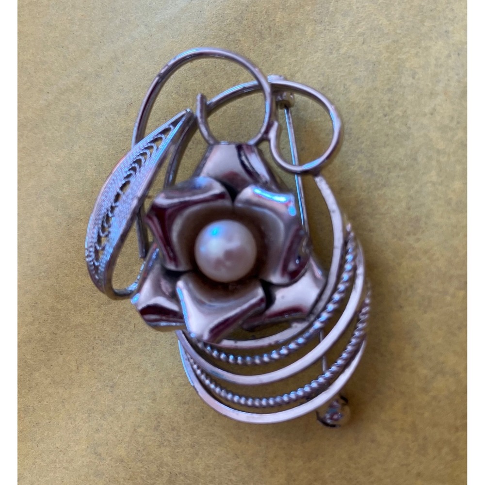 Modernist Woman's Floral Brooch with Unique Design